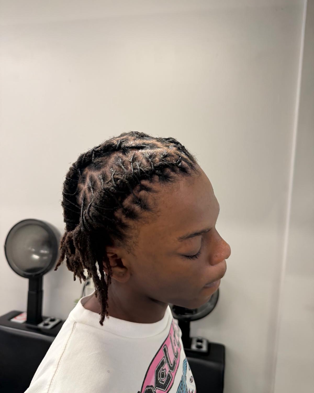 Fresh loc retwist styled at Royal Touch Studio