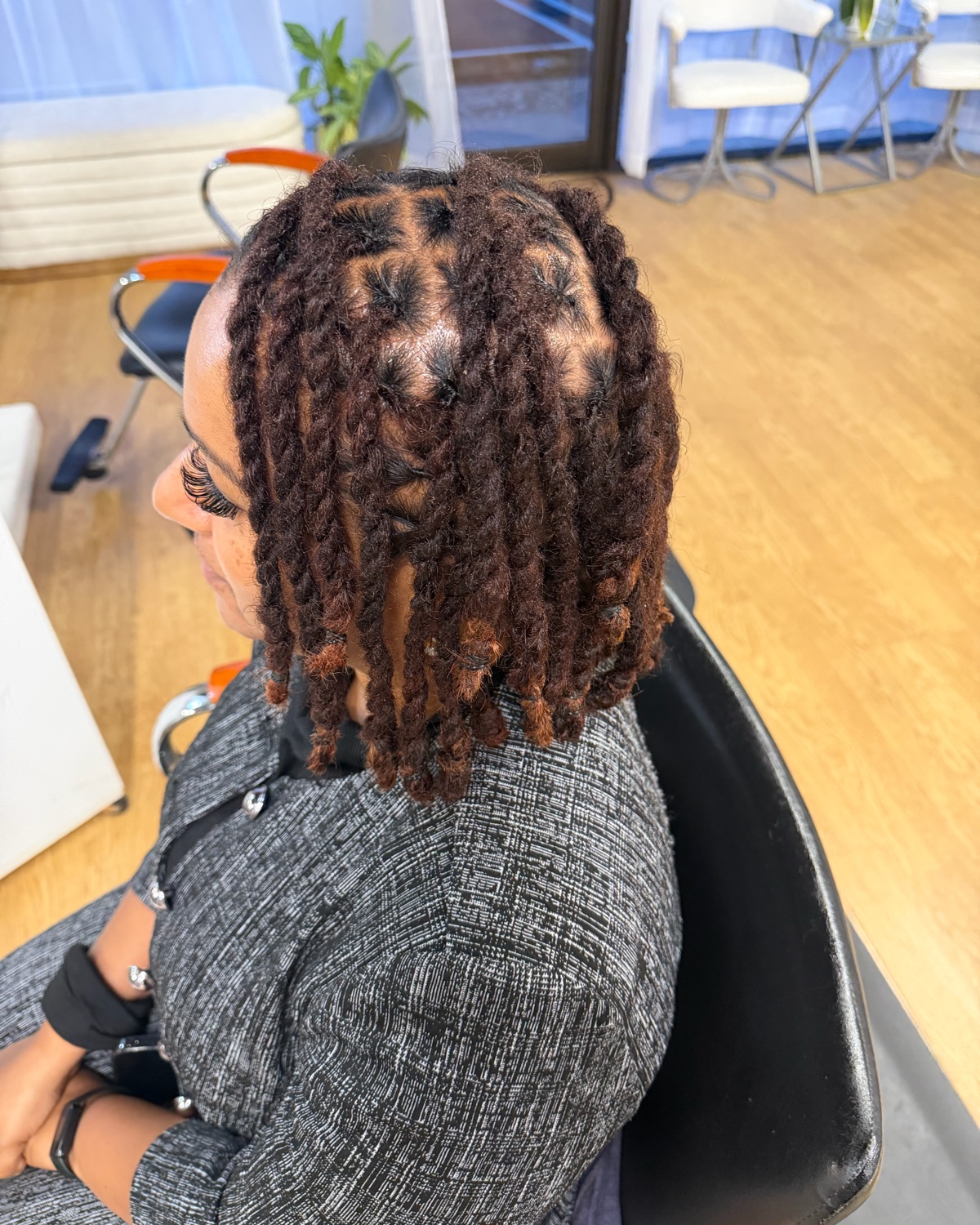 Two-strand twists styled at Royal Touch Studio